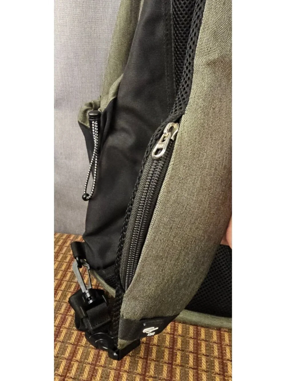 DC Sling Backpack Olive Black Adjustable Strap Multiple Compartments Durable Lig